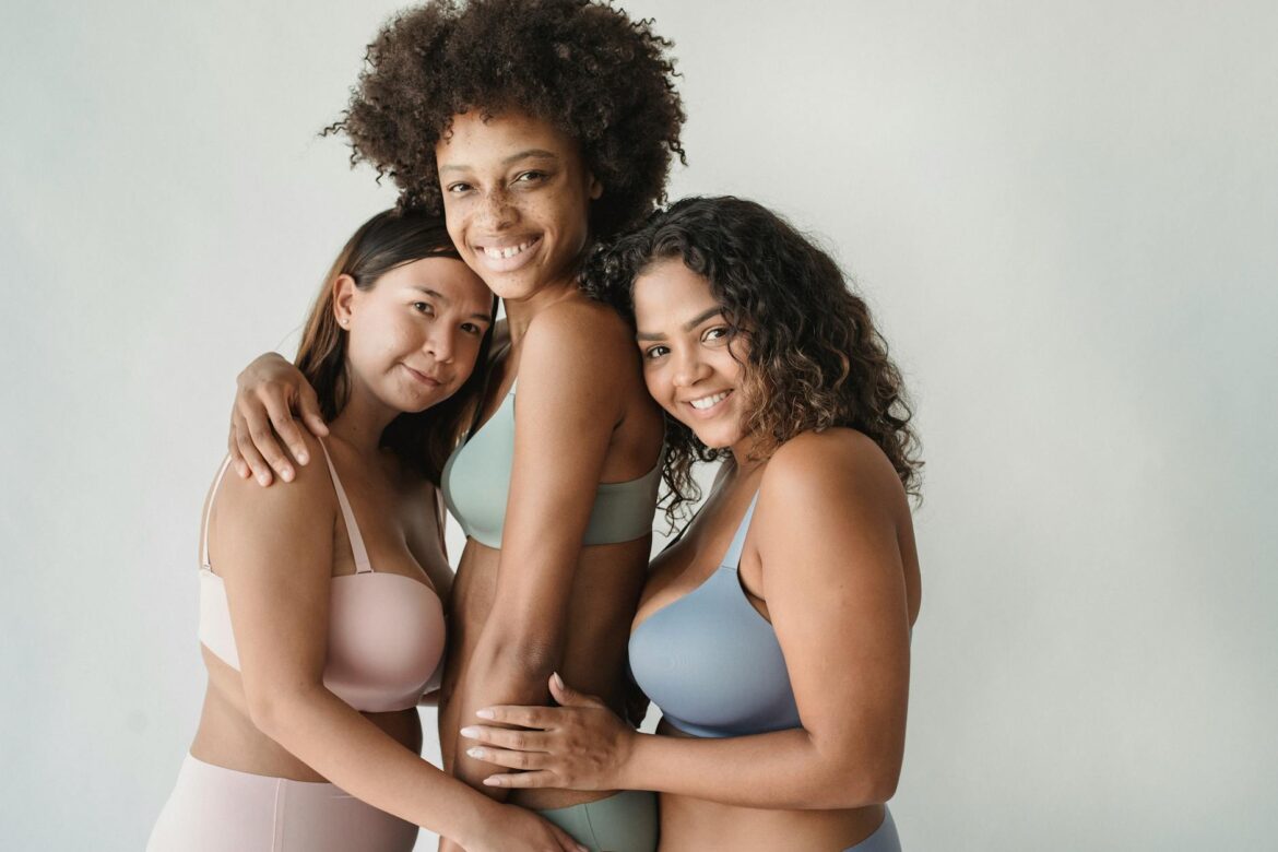 pexels-photo-5253456 women in bras hugging