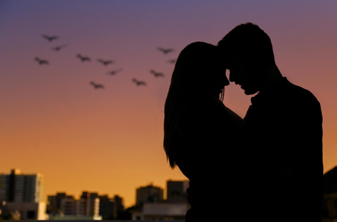 pexels-photo-2531611 silhouette photo of couple during golden hour